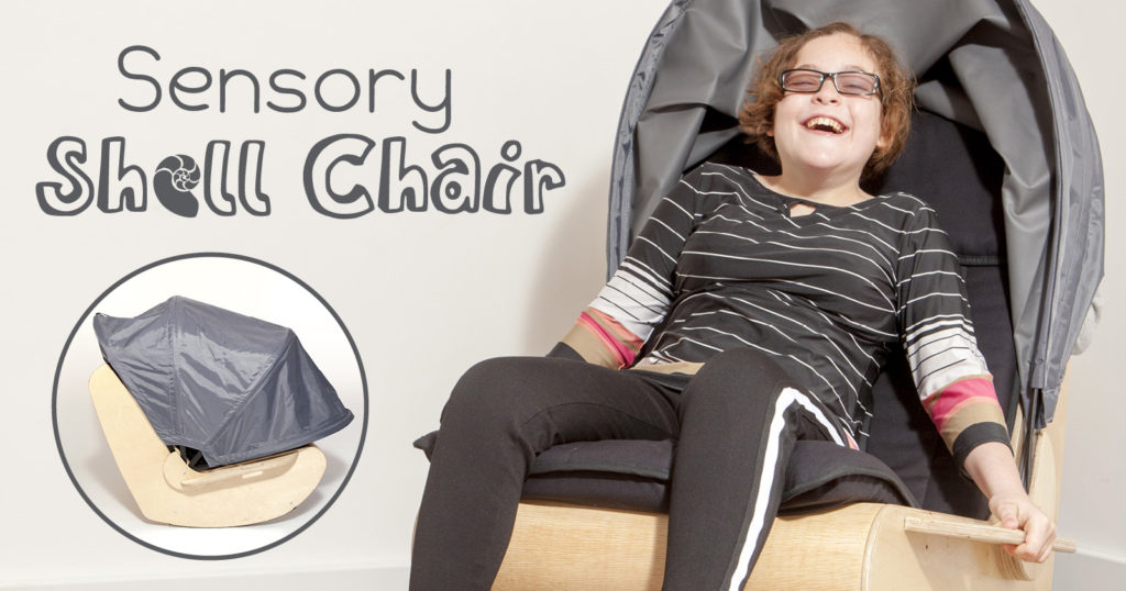 Girl in sensory shell chair