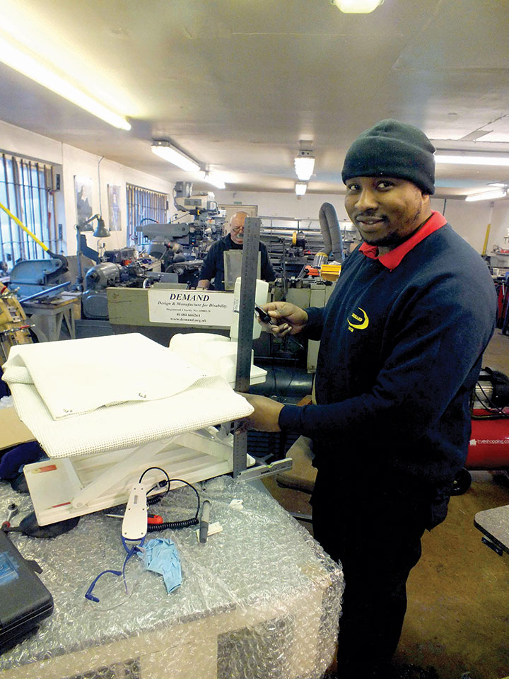 A DEMAND engineer services a bath seat